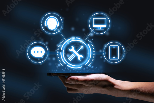 concept of creating customer service and support in the abstract graphics above a smartphone in the hands of a persona.