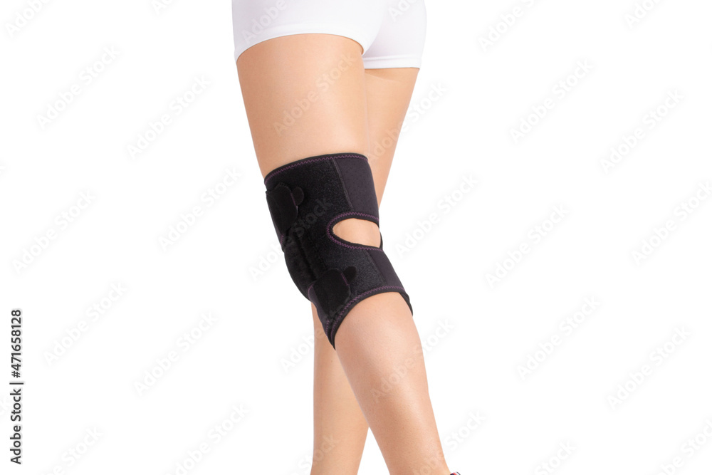 Knee Support Brace on leg isolated on white background. Orthopedic Anatomic. Braces for knee fixation, injuries and pain. Knee Joint Bandage Sleeve. Elastic Sports.