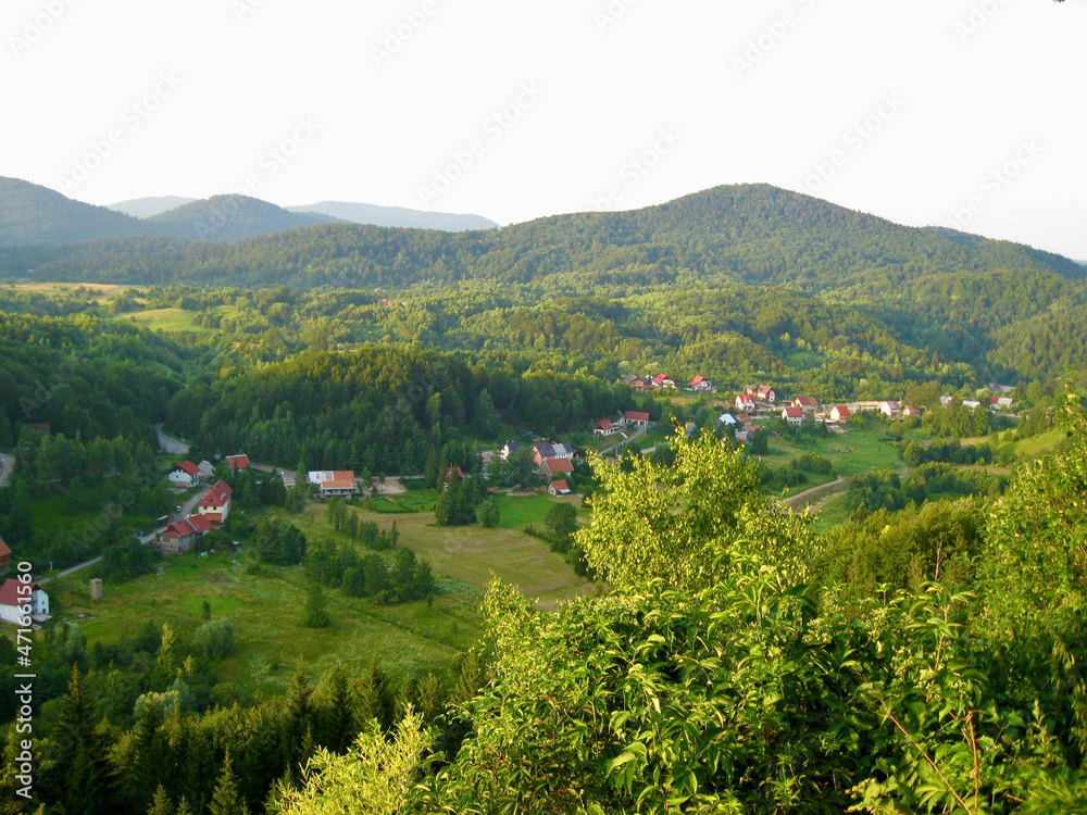 Springtime in a village seen from the hill where is situated picturesque town 