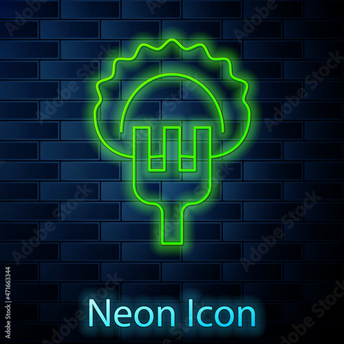 Glowing neon line Dumplings on fork icon isolated on brick wall background. Pierogi, varenyky, pelmeni, ravioli. Traditional Ukrainian food. Vector