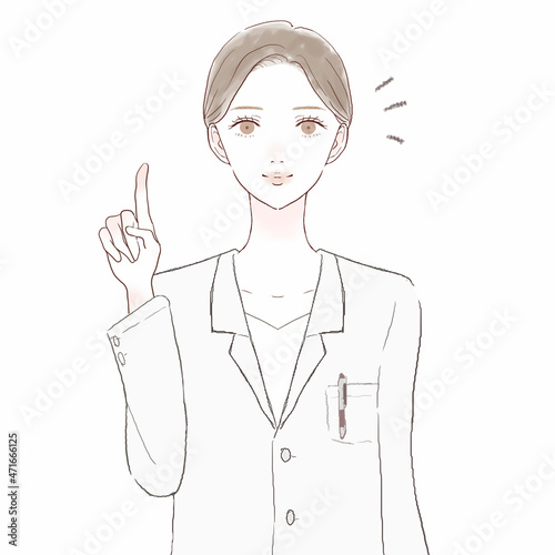 指をさしながら説明している女性医師