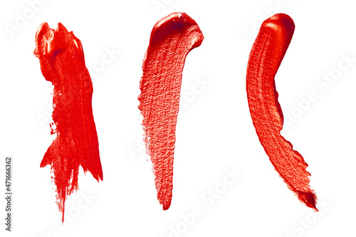 Real red lipstick paint smear stroke stain. Abstract red glittering textured background.