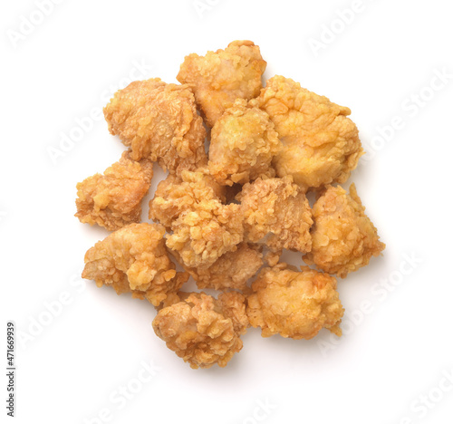 Fotografia Top view of fried battered spicy chicken chunks