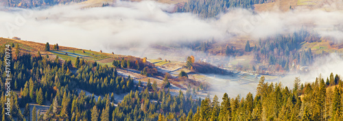 Obraz na płótnie Mountain morning autumn panorama. Colorful fall landscape, foggy sunrise w salonie