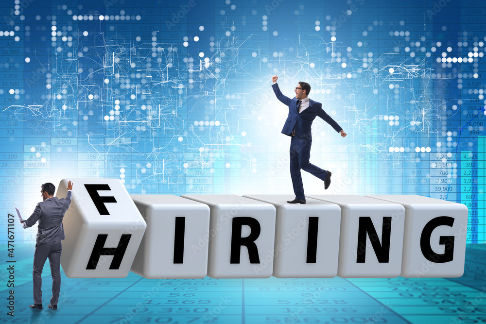 Hiring and firing concept with turning cubes Hiring and firing concept with turning cubes