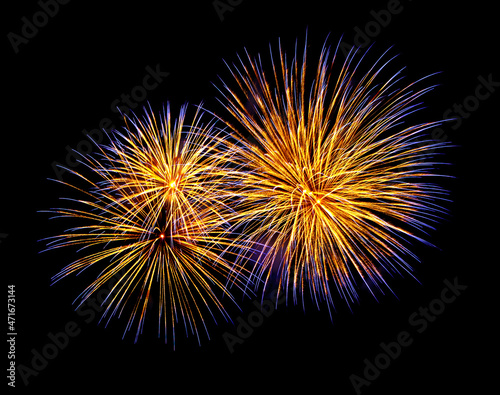 Gold and blue fireworks  isolated on a black background