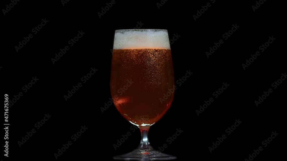 beer is poured into glass beer is poured into glass