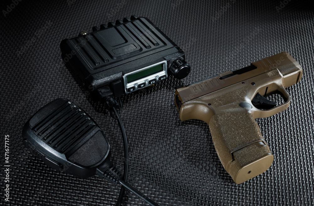 Emergency two way radio and pistol Emergency two way radio and pistol