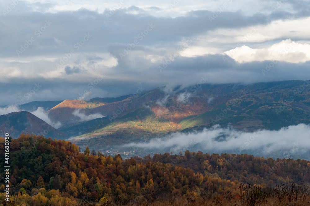 autumn landscape with morning fogs in dumesti, romania