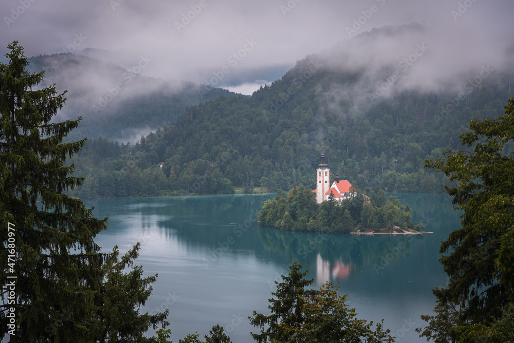 Beautiful mountain lake with Pilgrimage Church of the Assumption of Mary on a small island in summer, Bled, Slovenia