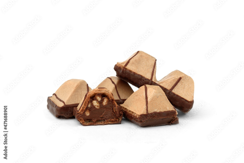 Pyramid shaped chocolate filled waffle cookies isolated on white background. Pyramid shaped chocolate filled waffle cookies isolated on white background.
