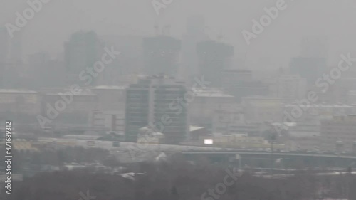 panoramic view from the observation deck Vorobyovy Gory Moscow Russia. Snowy misty winter day