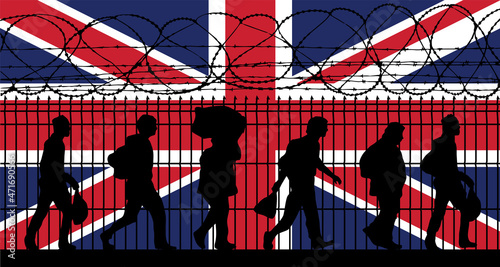United kingdom flag. Refugees near barbed wire fence. Immigrants used as a political weapon for Hybrid Attack photo