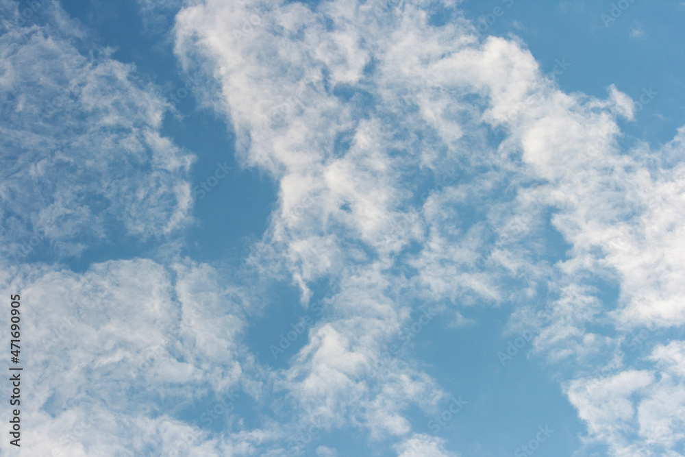 Spring blue sky with white clouds. Blue sky during the day. Spring blue sky with white clouds. Blue sky during the day.