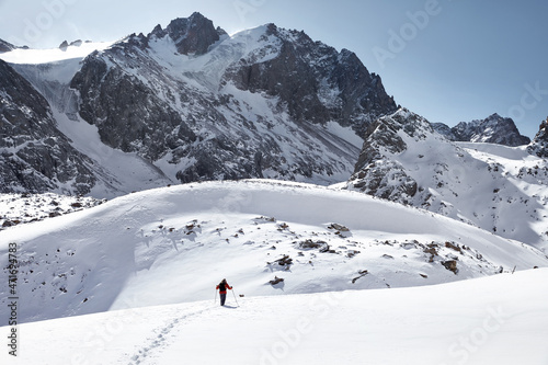 Hiker walking at beautiful mountain landscape