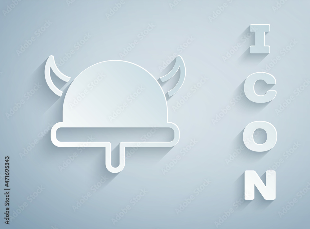 Paper cut Viking in horned helmet icon isolated on grey background. Paper art style. Vector Paper cut Viking in horned helmet icon isolated on grey background. Paper art style. Vector