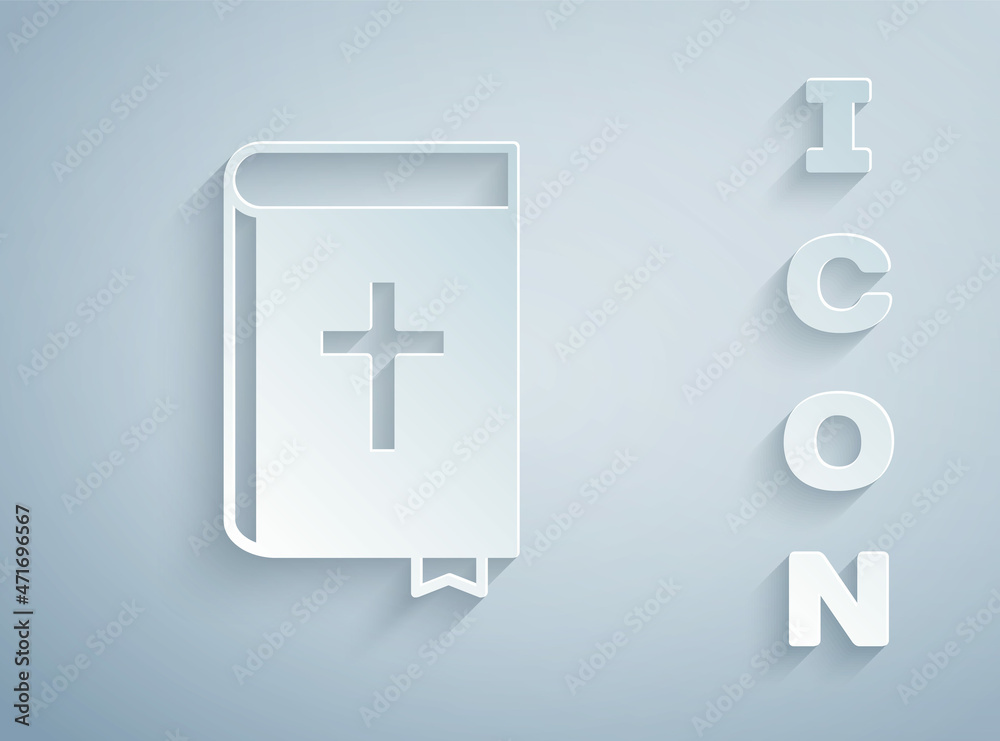 Obraz premium Paper cut Holy bible book icon isolated on grey background. Paper art style. Vector