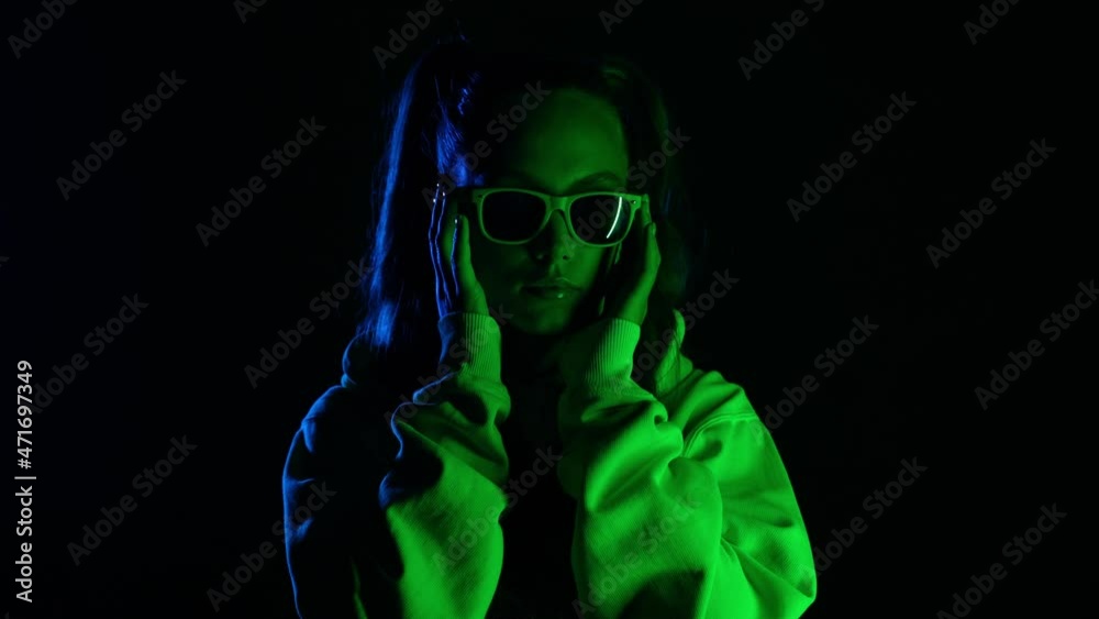 Studio shot of hip hop rocker star lady future technology abstract background Studio shot of hip hop rocker star lady future technology abstract background