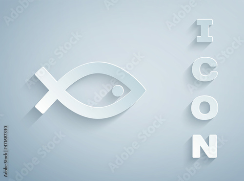 Paper cut Christian fish symbol icon isolated on grey background. Jesus fish symbol. Paper art style. Vector