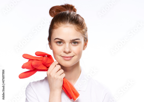 red-haired woman in white shirt cleaning lady housekeeping