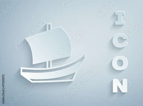 Paper cut Egyptian ship icon isolated on grey background. Egyptian papyrus boat. Paper art style. Vector