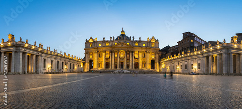 Panorama in Piazza San Pietro, or Saint Peters Square, during the blue hour with a view of the basilica in Vatican City.