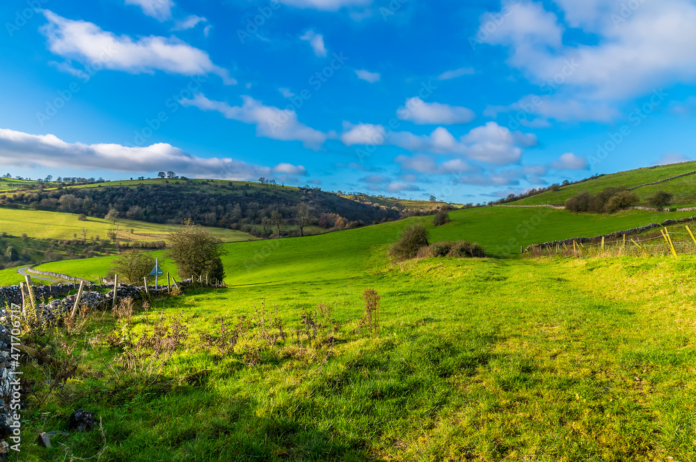 A view across the countryside towards the Manifiold valley next to the village of Wetton, UK on a sunny Autumn day A view across the countryside towards the Manifiold valley next to the village of Wetton, UK on a sunny Autumn day
