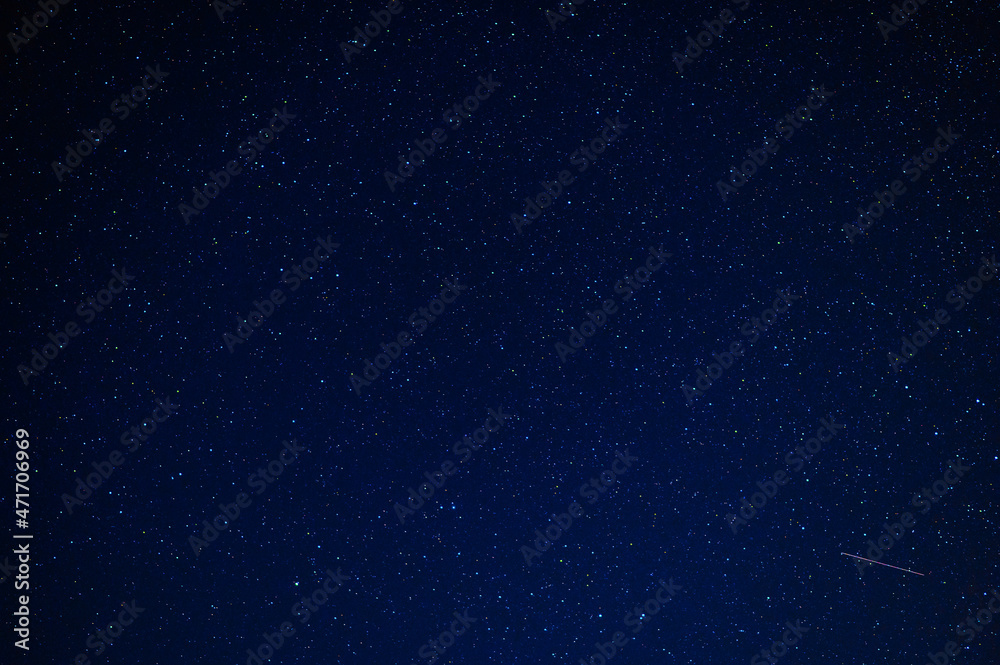Night starry sky with stars, constellations, nebulae and galaxies at night. Abstract dark blue background