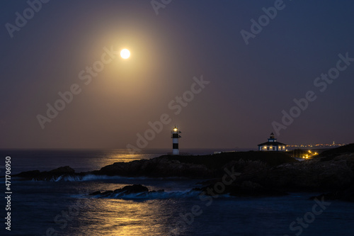 November Full Moon over the Illa Pancha lighthouse and hotel  in Ribadeo  Galicia  Spain 