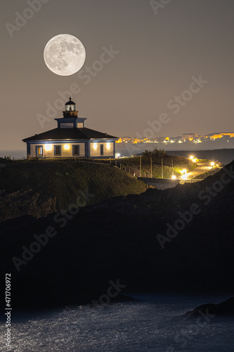 November Full Moon over the Illa Pancha lighthouse and hotel, in Ribadeo, Galicia, Spain! © AGUS