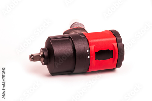 tools, impact pneumatics for unscrewing nuts in the car. on a white background. the color is red