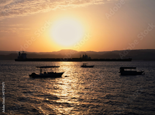 Scenic view at sunset from Aqaba Port , Jordan. Sunset on the Red Sea © Cristi
