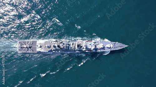 Aerial view of naval ship, battle ship, warship, Military ship resilient and armed with weapon systems, though armament on troop transports. support navy ship. Military sea transport. photo