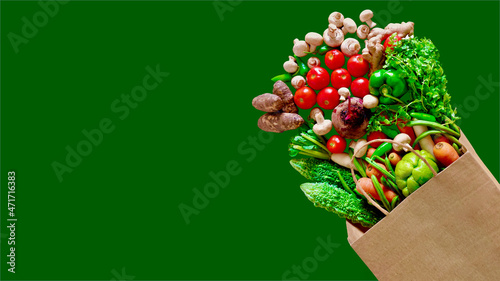 Fresh vegetable grocery bag. vegetable groceries paper bag supermarket cart. Top view copy space white background.