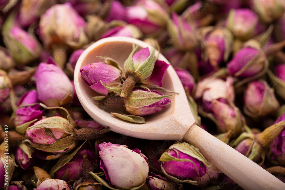 Dry rose buds. Dry young rose leaves. A tea drink made from rose petals. Dry rose buds. Dry young rose leaves. A tea drink made from rose petals.
