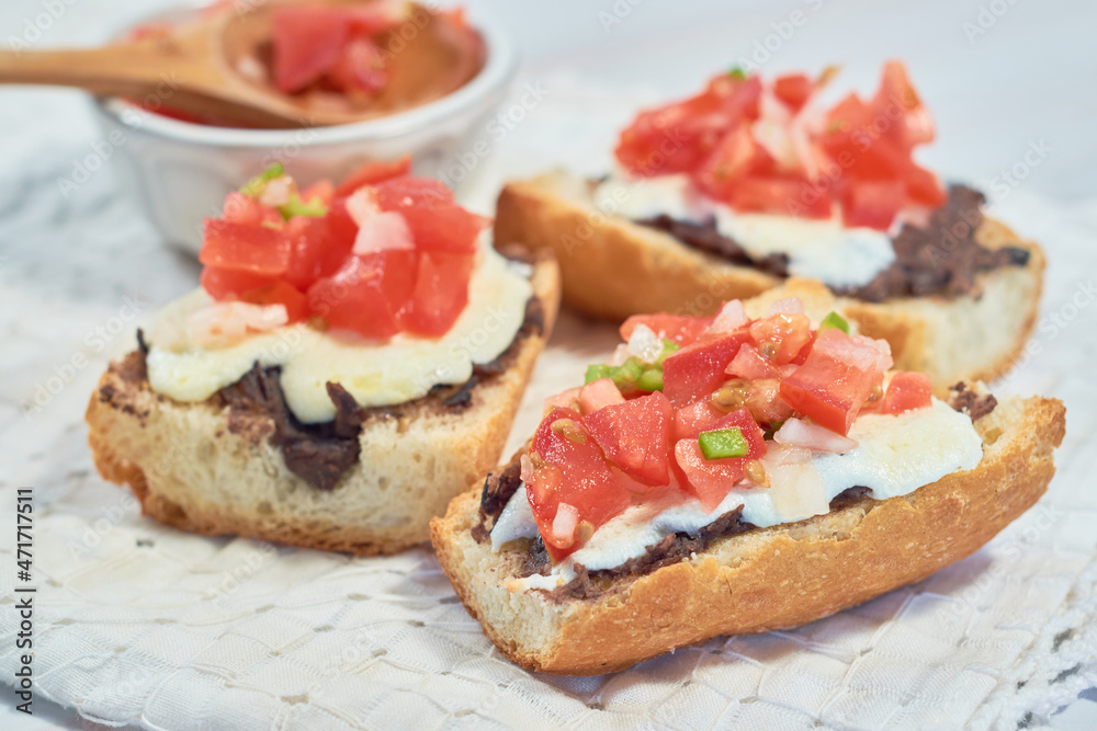 Traditional Mexican breakfast of molletes served.