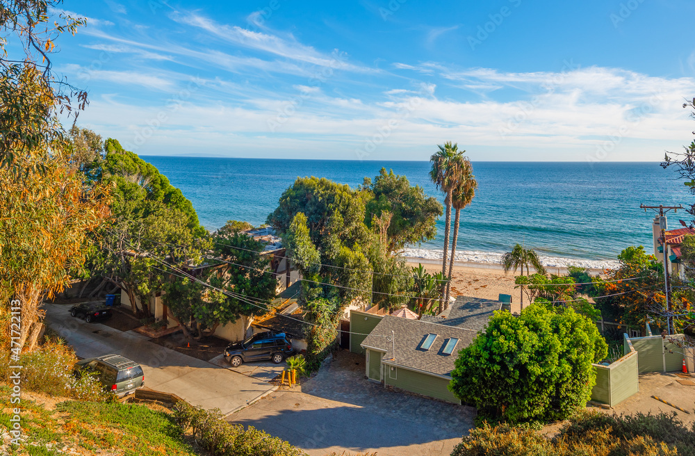 Luxury beach house in Malibu shore at sunset Luxury beach house in Malibu shore at sunset