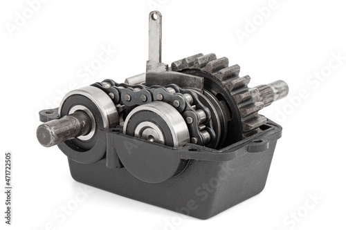 Gear reducer with chain drive, isolated on white background photo