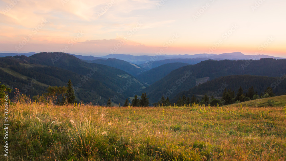 The hills of the Black Forest disappear into the haze in the evening. The hills of the Black Forest disappear into the haze in the evening.