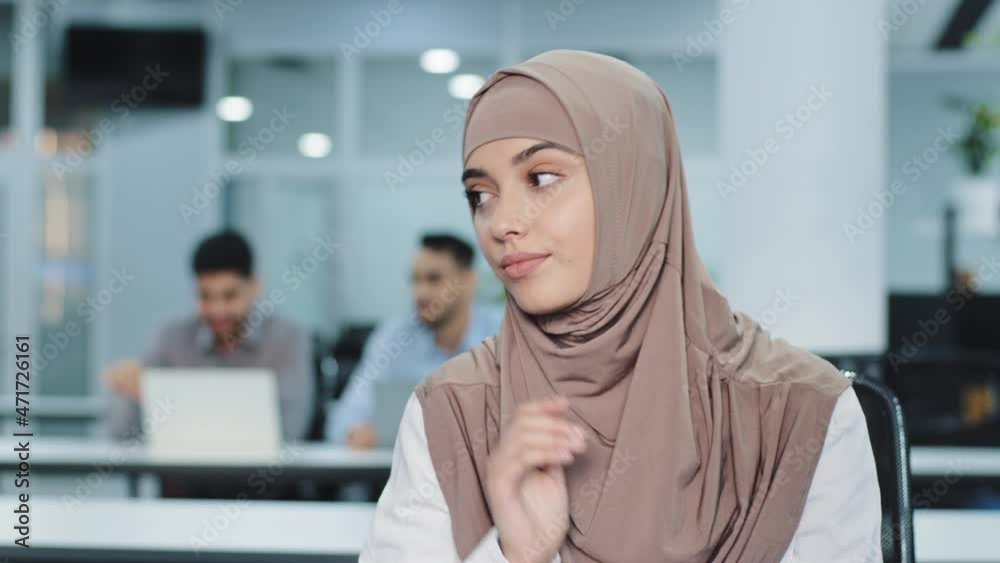 Tired female business leader in hijab says no, frustrated by failure. Young Indian woman suffering from headache, feeling unwell, refusing to talk, interview or work. Girl is dissatisfied with terms. Tired female business leader in hijab says no, frustrated by failure. Young Indian woman suffering from headache, feeling unwell, refusing to talk, interview or work. Girl is dissatisfied with terms.