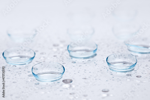 Wallpaper Mural contact lenses with droplets around close up view  - Image Torontodigital.ca
