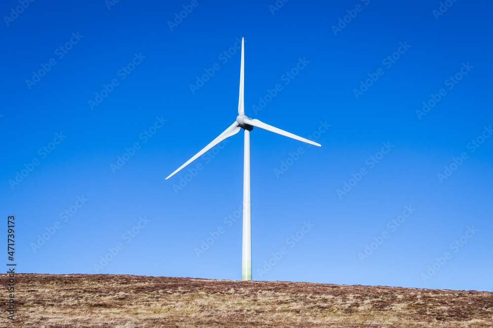 Windpark at the Handalm mountain range in Styria, Austria in autumn with blue clear skies	
