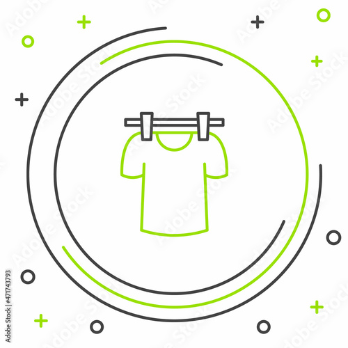 Line Drying clothes icon isolated on white background. Clean shirt. Wash clothes on a rope with clothespins. Clothing care and tidiness. Colorful outline concept. Vector