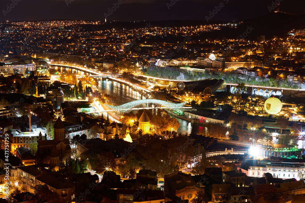 Fototapeta premium Night view of old town of Tbilisi. Tiflis is the largest city of Georgia, lying on the banks of Mtkvari River