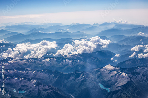 mountains and clouds from plane window