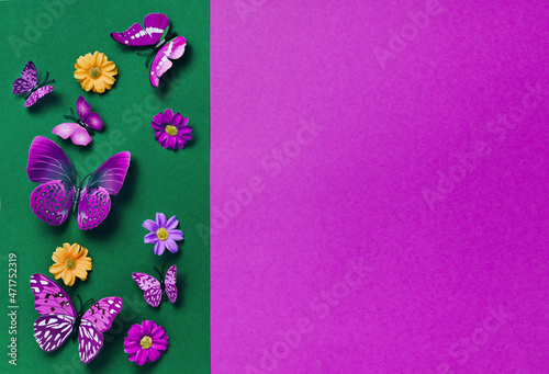 Vivid duotone green and violet background with butterflies. Color trends 2022. Minimal flat lay concept