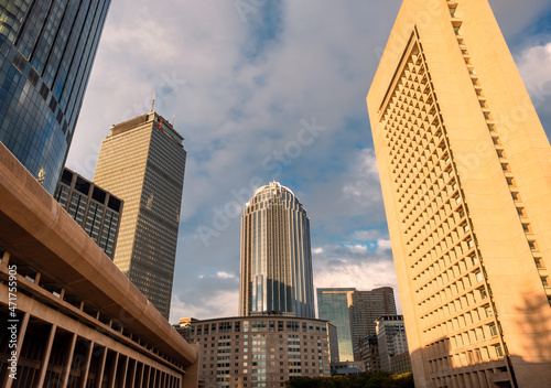 Modern city building architecture apartments. Low angle view of skyscrapers. Looking up perspective. Bottom view of modern skyscrapers in a business district. Cityscape at daylight.