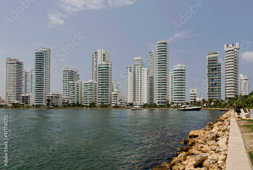 Cartagena Bay surrounded by large and modern buildings.