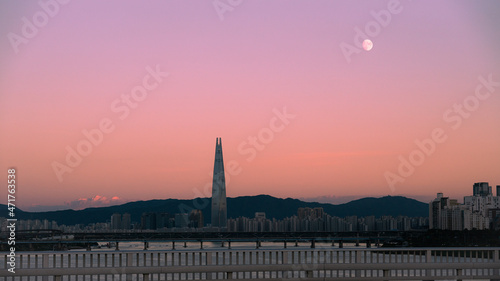 sunset over the city photo