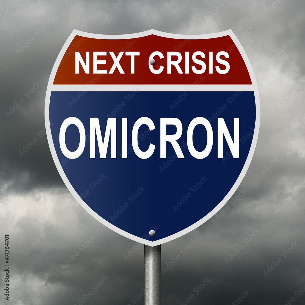 Rendered highway sign warning of new COVID-19 variant omicron with black clouds in background Rendered highway sign warning of new COVID-19 variant omicron with black clouds in background